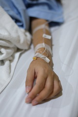 iv infusion intravenous injection of patient illness lying on bed