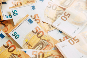 Layout of money on a white background Flatley. Paper money account in Europe. 50 Euro banknotes.