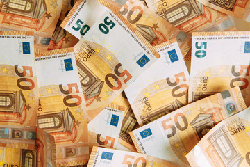 Layout of money on a white background Flatley. Paper money account in Europe. 50 Euro banknotes.