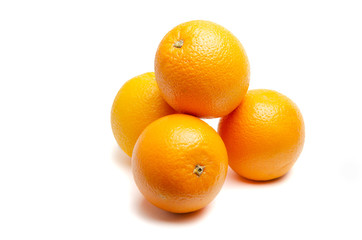 four oranges isolated on white background