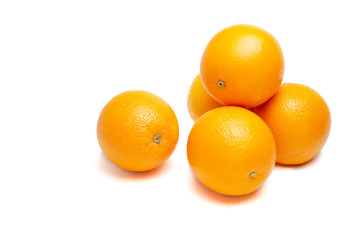 fresh oranges isolated on white background