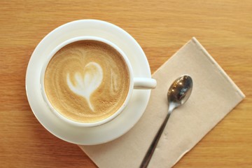 cup of coffee on table top view