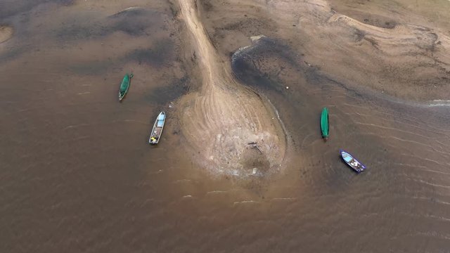 Aerial view Footage B roll of Climate change concept. Aerial fly over view of fisherman boat and dry lake and climate change. The drought of the river caused by global warming. Footage B roll scene 4k