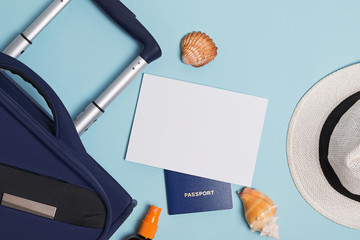 Suitcase, passport, sunglasses and empty paper. Travel mock-up