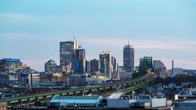4K UHD Time lapse : Boston cityscape skyline sunset as fantastic twilight with Zakim bridges and highways at dusk. in Boston, Massachusetts, USA. United state downtown beautiful colorful skyline.