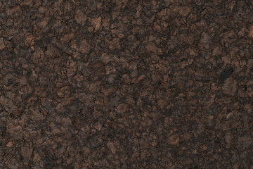 Texture of dark cork with oil finish