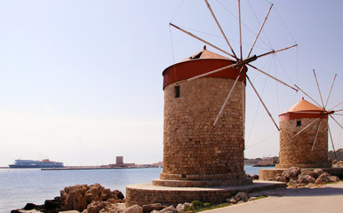 Windmills in Mandraki harbour, Rhodes, Greece
