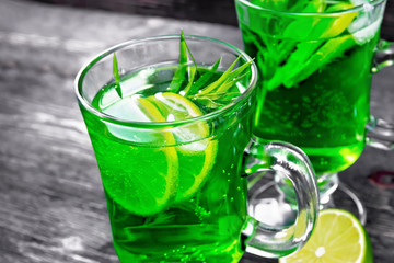 Lemonade Tarragon in two goblets on board