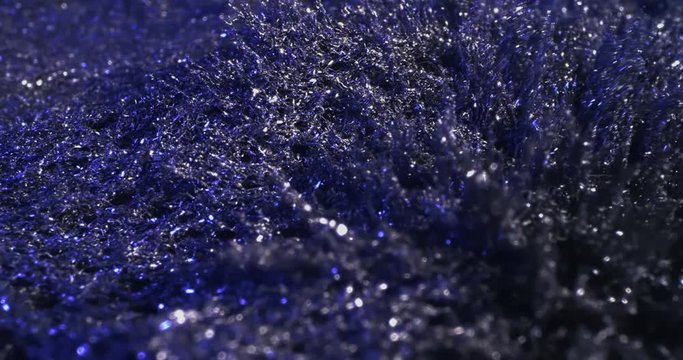 Motion Metallic Powder Under the Influence of a Magnetic Feld. Macro.
