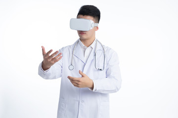 A young Asian doctor is using a device