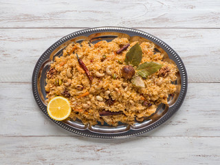 Vegetable Biryani, Vegetarian dish on a black table. Top view, copy space