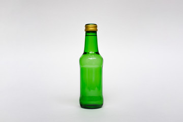 Green bottle isolated on white background.Can be use for your design.High resolution photo.