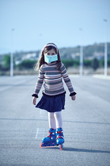 girl skating with mask in the empty streets