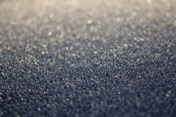 Frost on the car. Details of the car. Getting the sun and frost. Early spring Sunrise Morning.