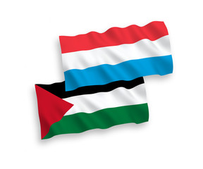 Flags of Palestine and Luxembourg on a white background