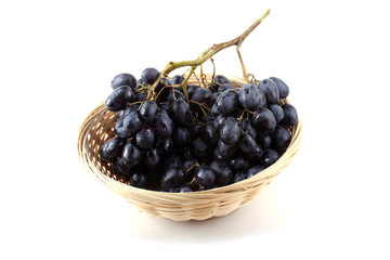 Grape on wicker plate