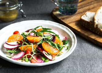 Orange with Beetroot, Rocket ,Radish and Pumpkin seed salad