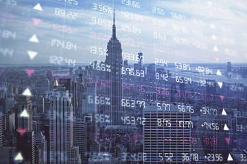 Forex graph on city view with skyscrapers background double exposure. Financial analysis concept.