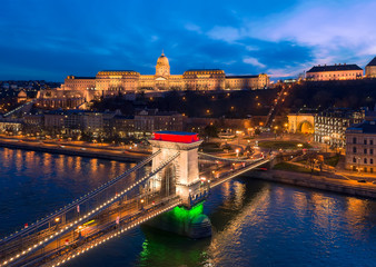 Europe Hungary Budapest Decorated Szechenyi Chain bridge Danube river Buda castle.