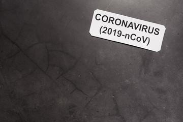 Coronavirus concept. 2019-nCoVid. Dark background, copy space.