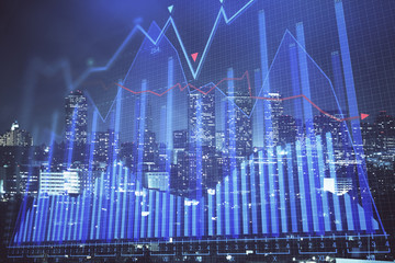 Financial graph on night city scape with tall buildings background multi exposure. Analysis concept.