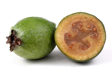 Feijoa fruit with a half