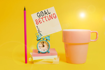 Word writing text Goal Setting. Business photo showcasing process of identifying something that you...