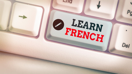 Conceptual hand writing showing Learn French. Concept meaning get knowledge or skill in speaking...