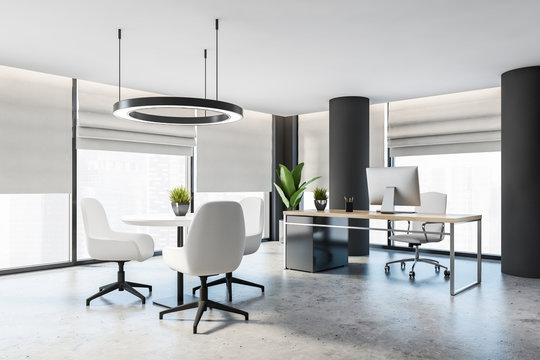 Gray CEO office with columns and round table