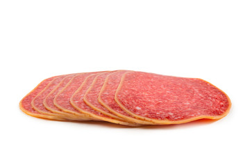 Salami slices isolated on white background.