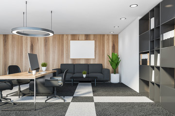 Wooden and white CEO office with sofa and poster