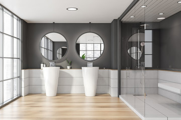 White and gray bathroom with sinks and shower