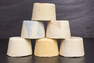 bars of eco friendly solid shampoo to avoid plastic packaging - zero waste concept