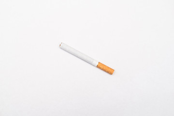 Cigarette on a light background.
