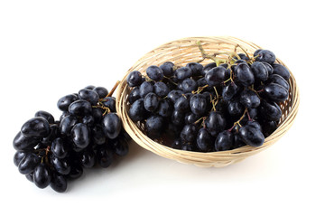 Grape on wicker plate