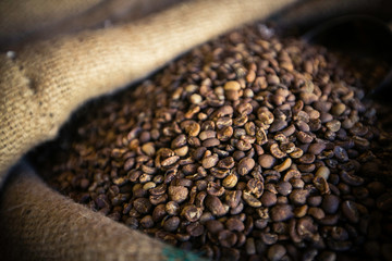 Roasted Coffe Beans in Rustic Burlap Sack