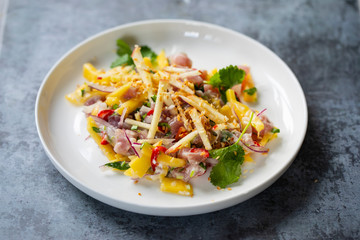 Tuna ceviche with coconut milk, mango, chilli and lime juice