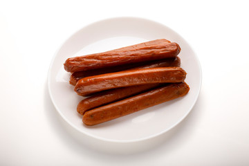 Food swap. Meatless smoked sausages on plate