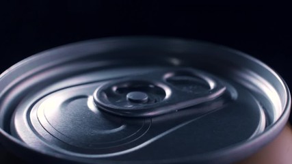 Rotation of an iron can of carbonated drink, slow motion video, medium, extreme, large, large, telephoto lens, sound, drink sound. - Powered by Adobe