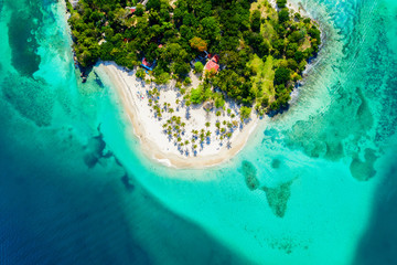 Aerial drone view of beautiful caribbean tropical island Cayo Levantado beach with palms. Bacardi Island, Dominican Republic. Vacation background.