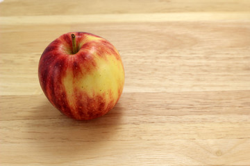 Red apple on board