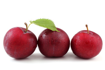 Three red plums