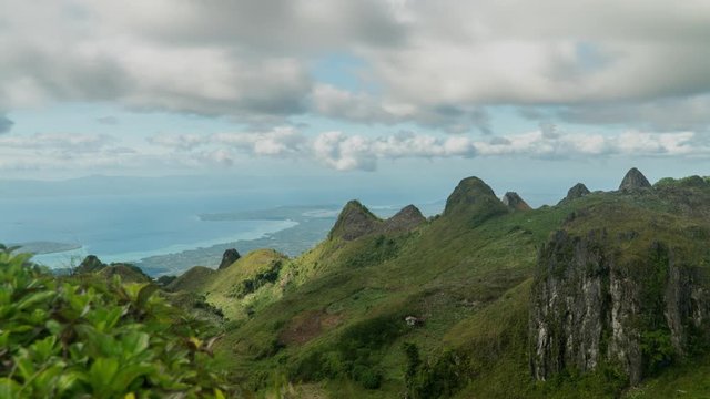 Timelaps of  Osmena peak in the morning under the cloudy sky. Time lapse of Osmena Peak Cebu Island, Philippines on a clear day with sea in the background. Famous tourist attraction in Cebu.