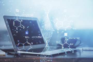 Desktop computer background and DNA drawing. Double exposure. Science concept.