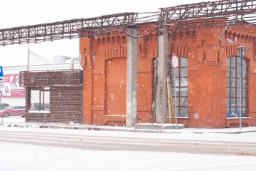 old red brick houses in heavy snowfall