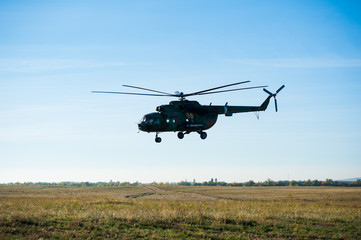 Fototapeta na wymiar Military helicopter flying during exercise