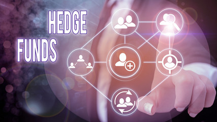 Conceptual hand writing showing Hedge Funds. Concept meaning basically a fancy name for an alternative investment partnership