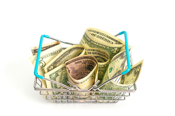 Obraz premium basket with blue inserts inserted into the wrapped dollar bills on a white background. isolate