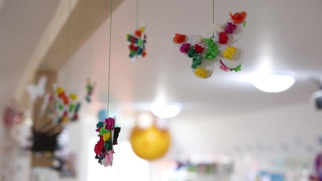 Children Crafts Depicting Butterflies Hanging From Ceiling