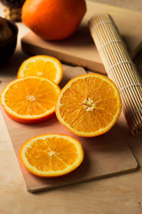 Sliced orange slices. Round orange slices on the table